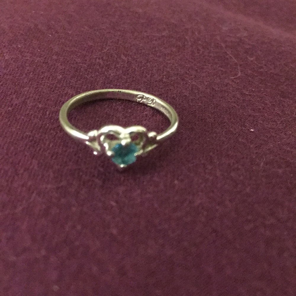 Sterling silver heart with blue stone